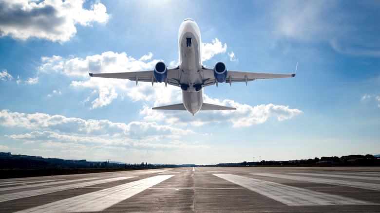 View of an airplane taking off from the runway
