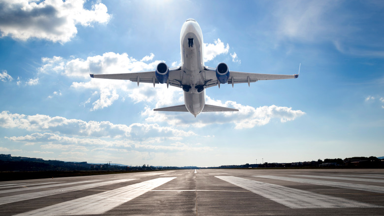 View of an airplane taking off from the runway