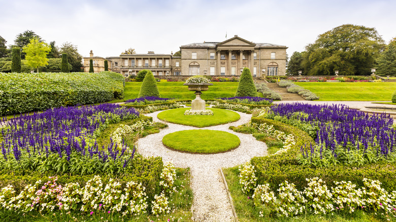 View of the Palladian facade and gardens in Tatton Park, Knutsford, England