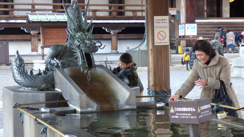 Chozuya with dragon statue at Higashi Hongan-ji Temple in Kyoto, Japan