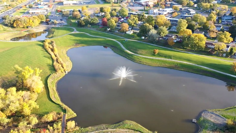 An aerial view of a fountain and pond in Central Park, La Vista, Nebraska