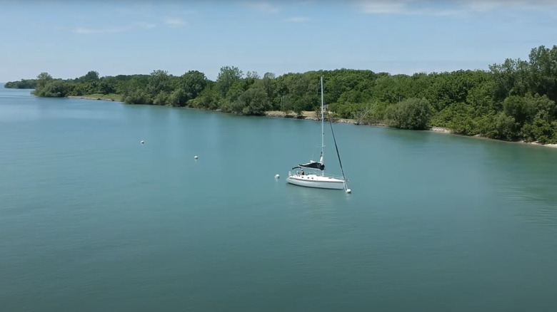 Drone image of North Bass Island Coast and sailboat