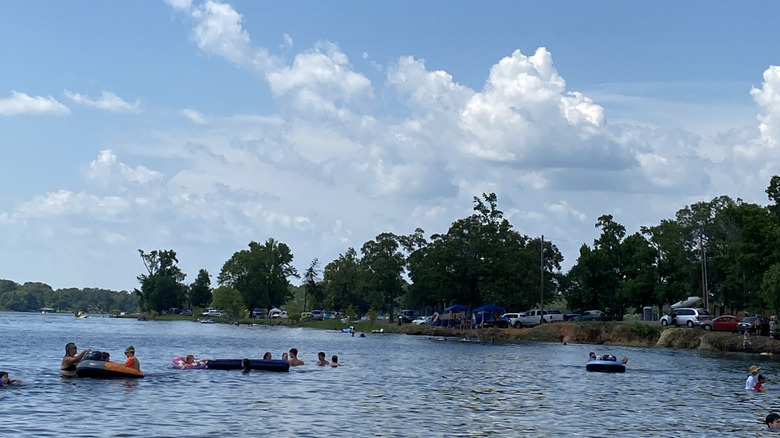 Multiple people in the water at Lake Holbrook