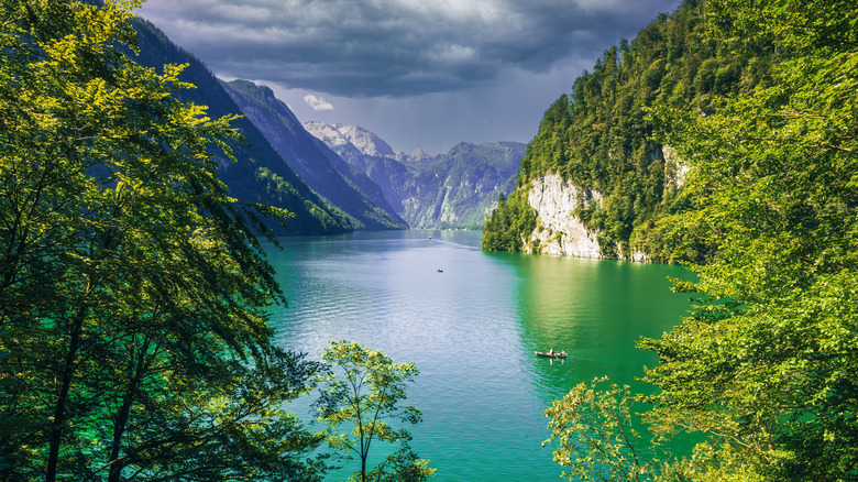 High mountains loom above the clear waters of the Königssee