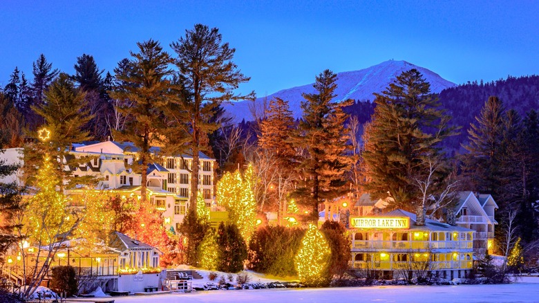Exterior of Mirror Lake Inn at night in the winter