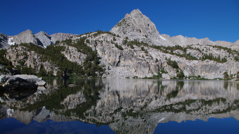 Lamarck Lakes is framed by a mountain range in California.