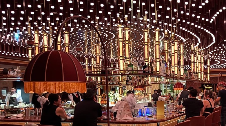 People sitting at the bar at Bazaar Meat in Las Vegas