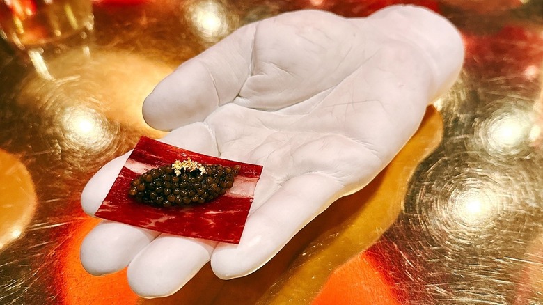 Caviar and gold leaf on Iberico ham