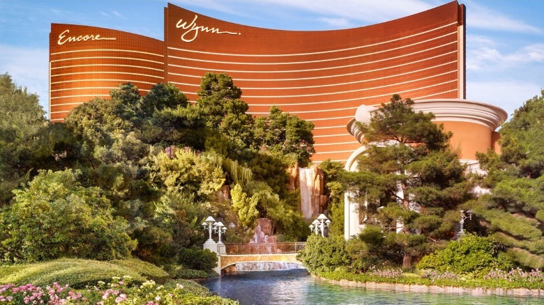 Wynn Las Vegas bridge over water surrounded by greenery