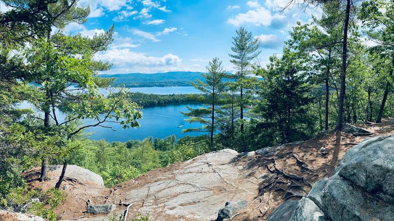 Newfound Lake, New Hampshire, from a rocky overlook surrounded by trees
