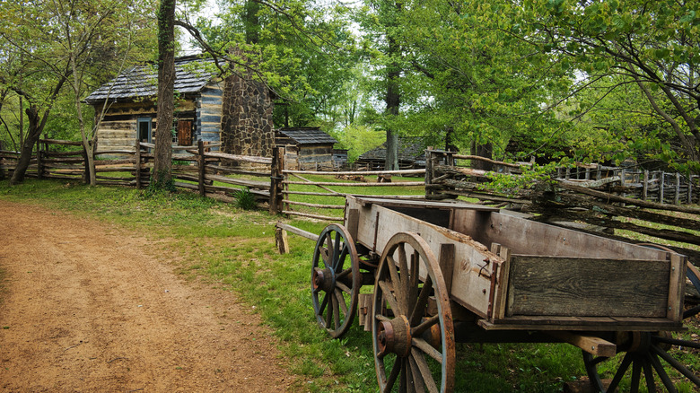 Ancient wooden structures and wagon at Lincoln State Park, Indiana