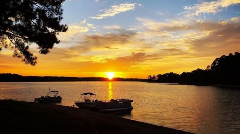 Sunset over Clarks Hill Lake with boats docked