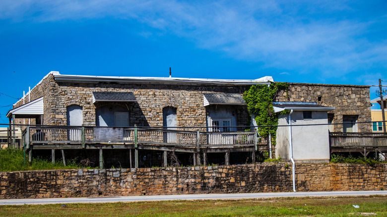 Granite building by a train track in Lithonia
