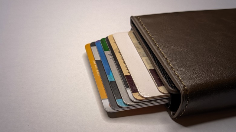 an RFID-blocking wallet with cards sticking out, against a white background