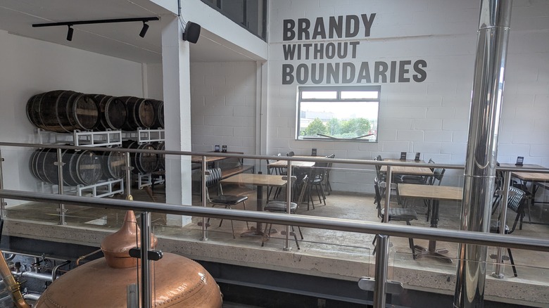 Tables and stills at a brandy distillery