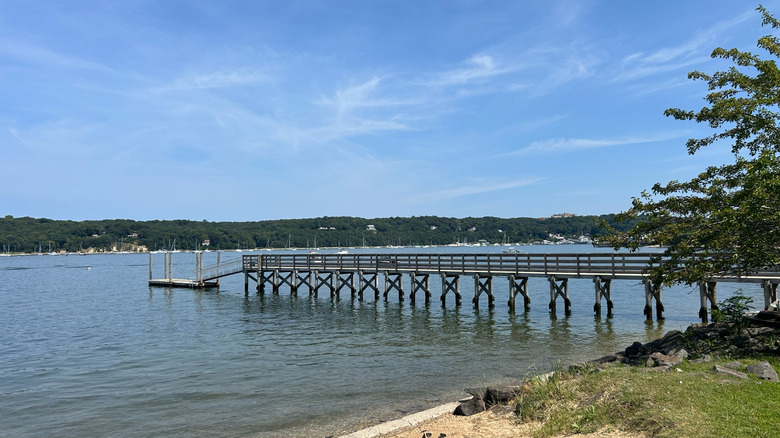 A pier by the beach on a summer afternoon in California Park in East Setauket, Long Island, New York