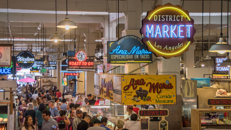 Grand Central Market in Downtown Los Angeles loaded with people looking for food at lunchtime.