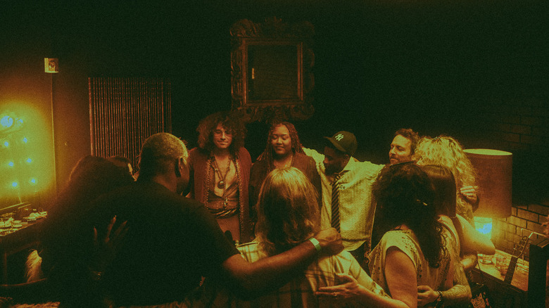 Interior image from a performance of "Brassroots District: LA '74," an immersive funk-music-centered experience playing at Catch One nightclub in Los Angeles, California.