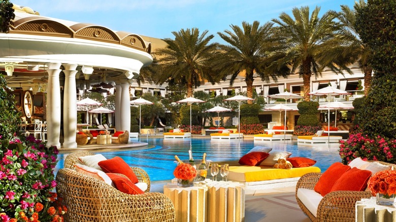 View of the European Pool at Encore Hotel in Las Vegas showing sun lounges, parasols, and champagne on ice