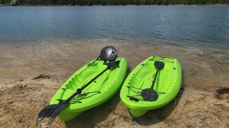 Two green kayaks at Lake Isabel Farm in Louisiana