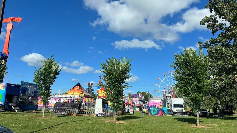 Carnival rides and games set up for Lowell's annual Mudtown Days festival