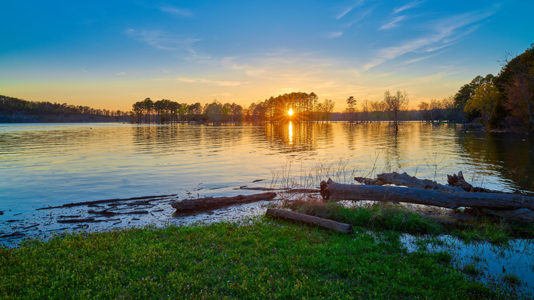 The sun sets across Beaver Lake, near Lowell and Rogers, Arkansas