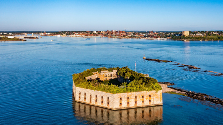 An aerial view of Fort Gorges in Maine with Falmouth's shoreline in the background