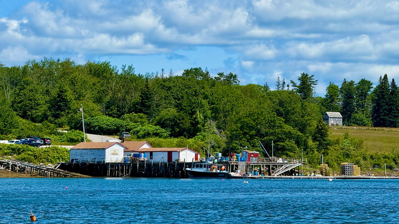 A lobster wharf perched along the waters in Bristol, Maine