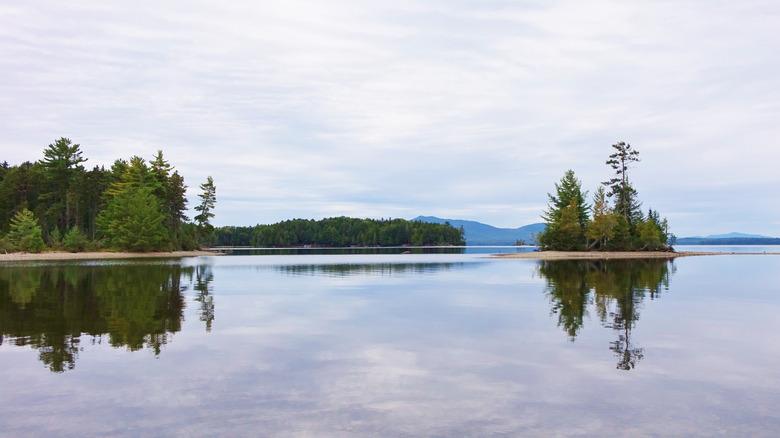 Moosehead Lake in Maine's Lily Bay State Park on a cloudy but calm autumn day.