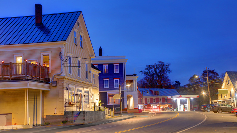 Lit buildings in downtown Kingfield at dusk