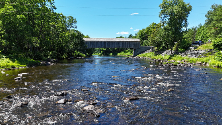 A bridge over a river in one of Dover‑Foxcroft's parks