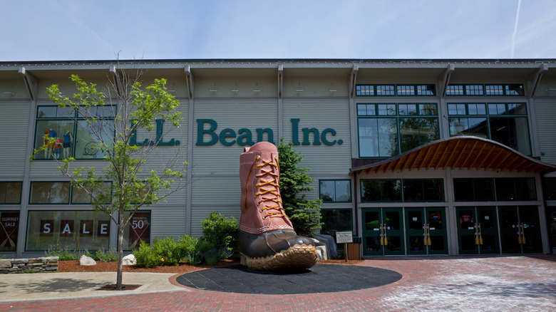 A giant duck boot sculpture in front of an L.L. Bean store
