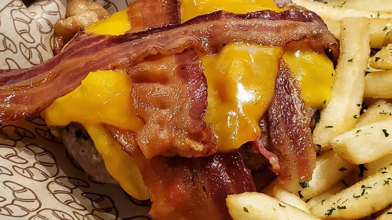 bacon cheeseburger and fries from Bubba's 33