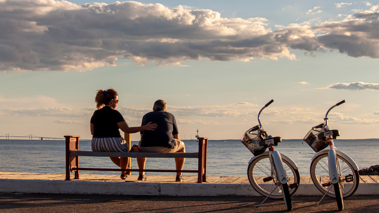 Couple looking out to sea in Rock Hall