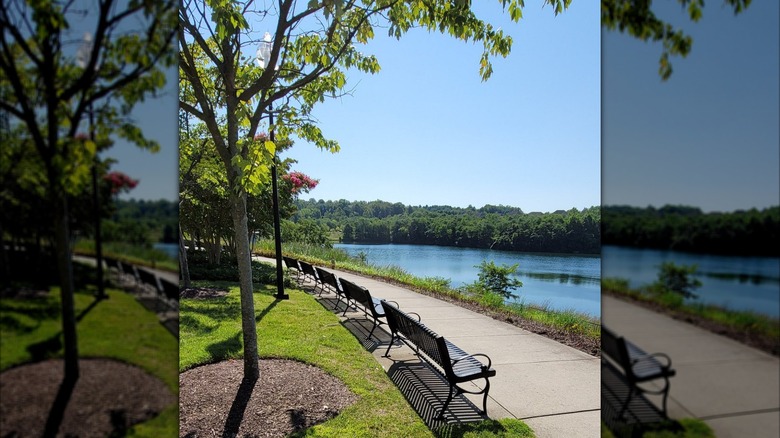 A trail winding around the Quarry Lake at Greenspring in Maryland