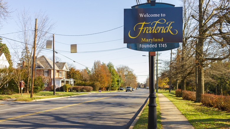 Welcome to Frederick sign in Maryland next to residential road