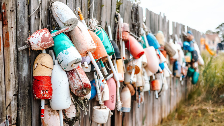 Colorful buoys hanging on a fence on Smith Island