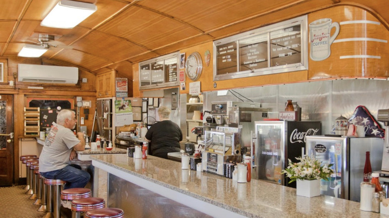 Interior of the Miss Florence Diner with a customer eating