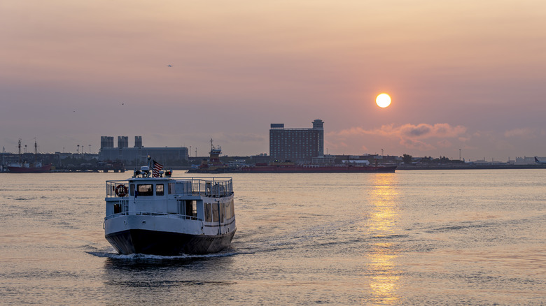 Boston ferry on the water at sunset