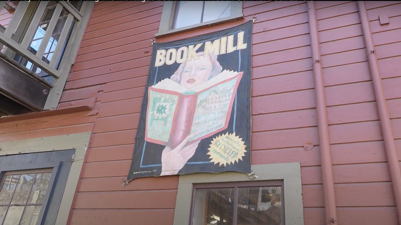 Outside Montague Bookmill with Bookmill sign