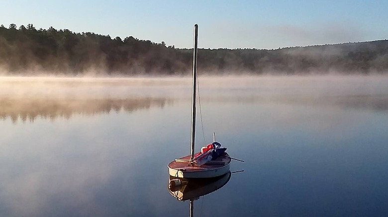 A small sailboat resting on Lake Wyola's calm waters
