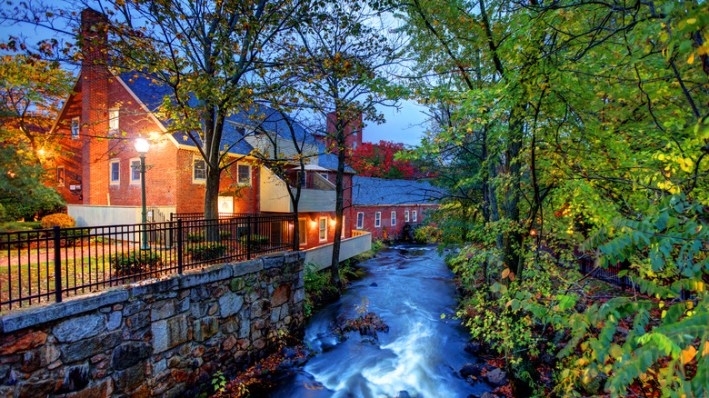 plumbush creek past historic brick building