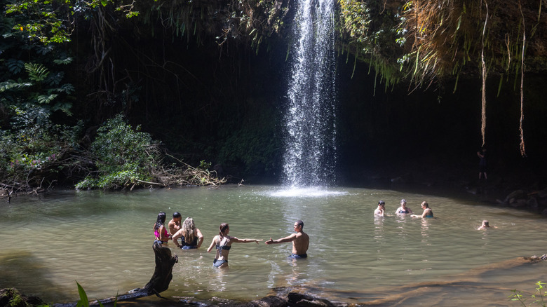Enjoying a dip at Twin Falls, Maui.