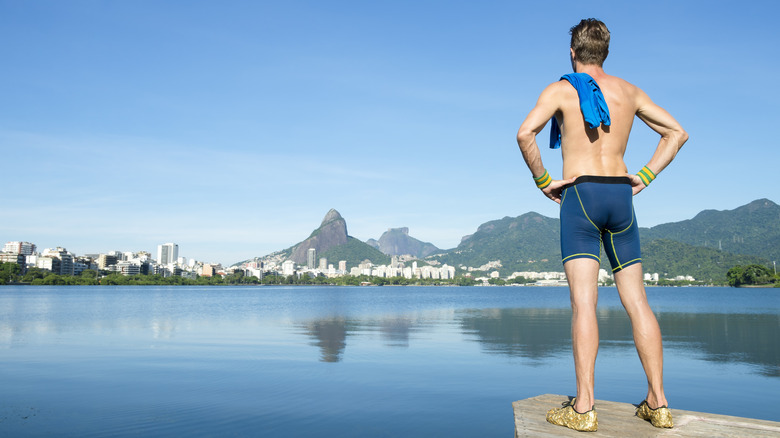 Man in a jammer-style swimsuit