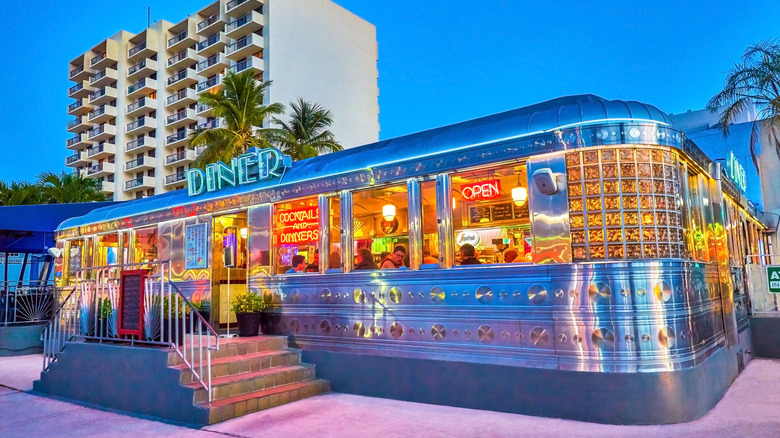 Neon signs on the facade of the 11th Street Diner in Miami, Florida