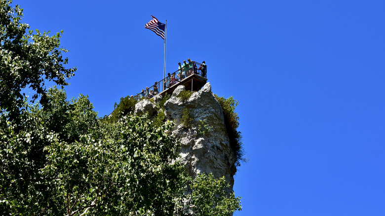 Visitors standing on the lookout at Castle Rock in the Upper Peninsula of Michigan