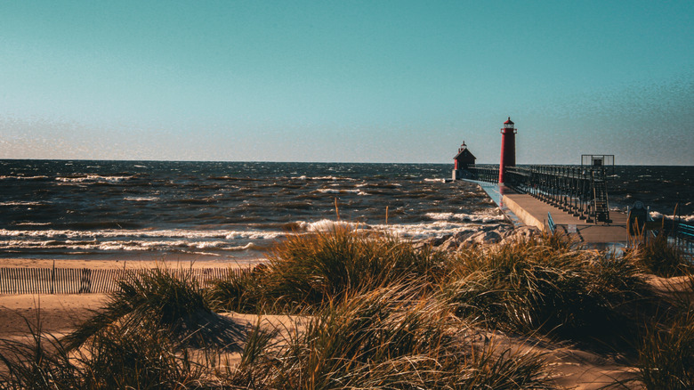 Grand Haven, Michigan beach and pier during sunset