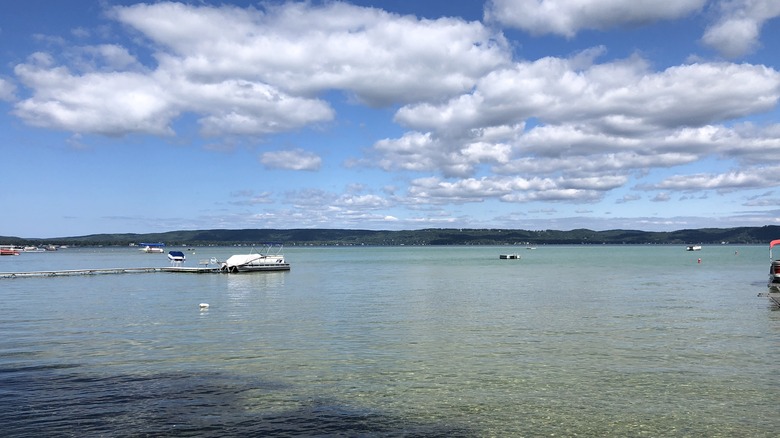 Boats and docks floating on Glen Lake, Michigan on a sunny day