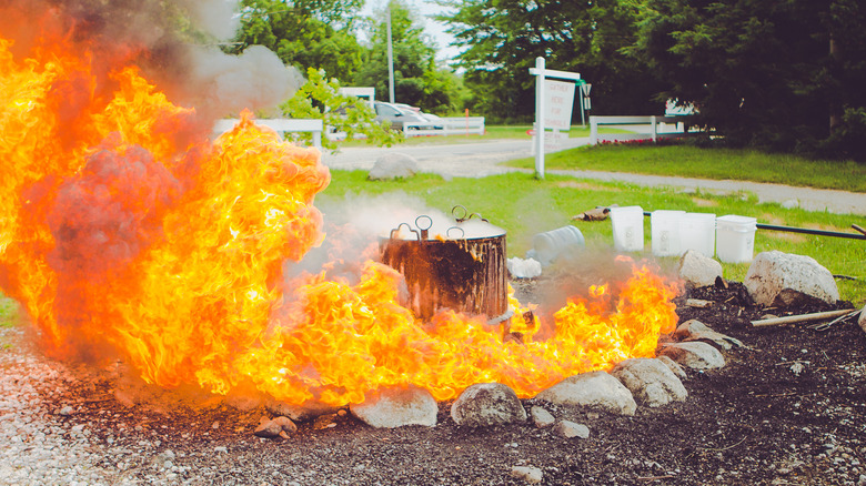 The flames of a traditional fish boil in Shelby, Michigan