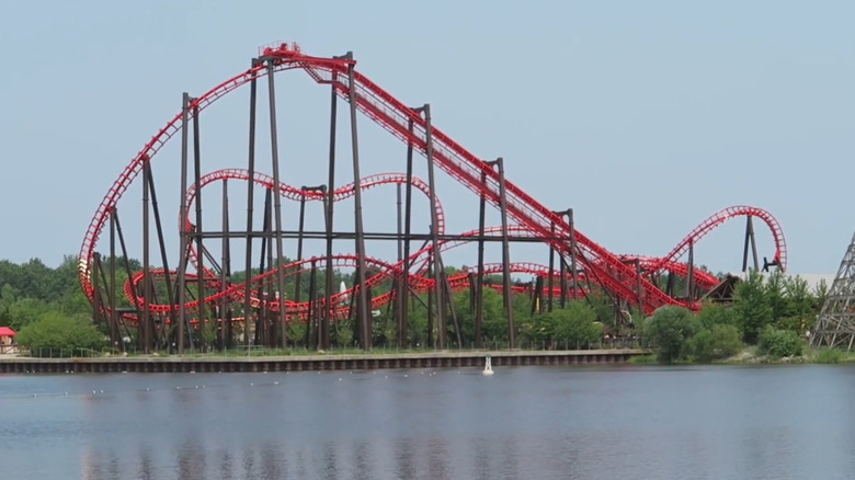 Wide shot of Michigan Adventure's Thunderhawk coaster on summer day.